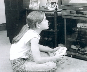 Girl playing computer game
